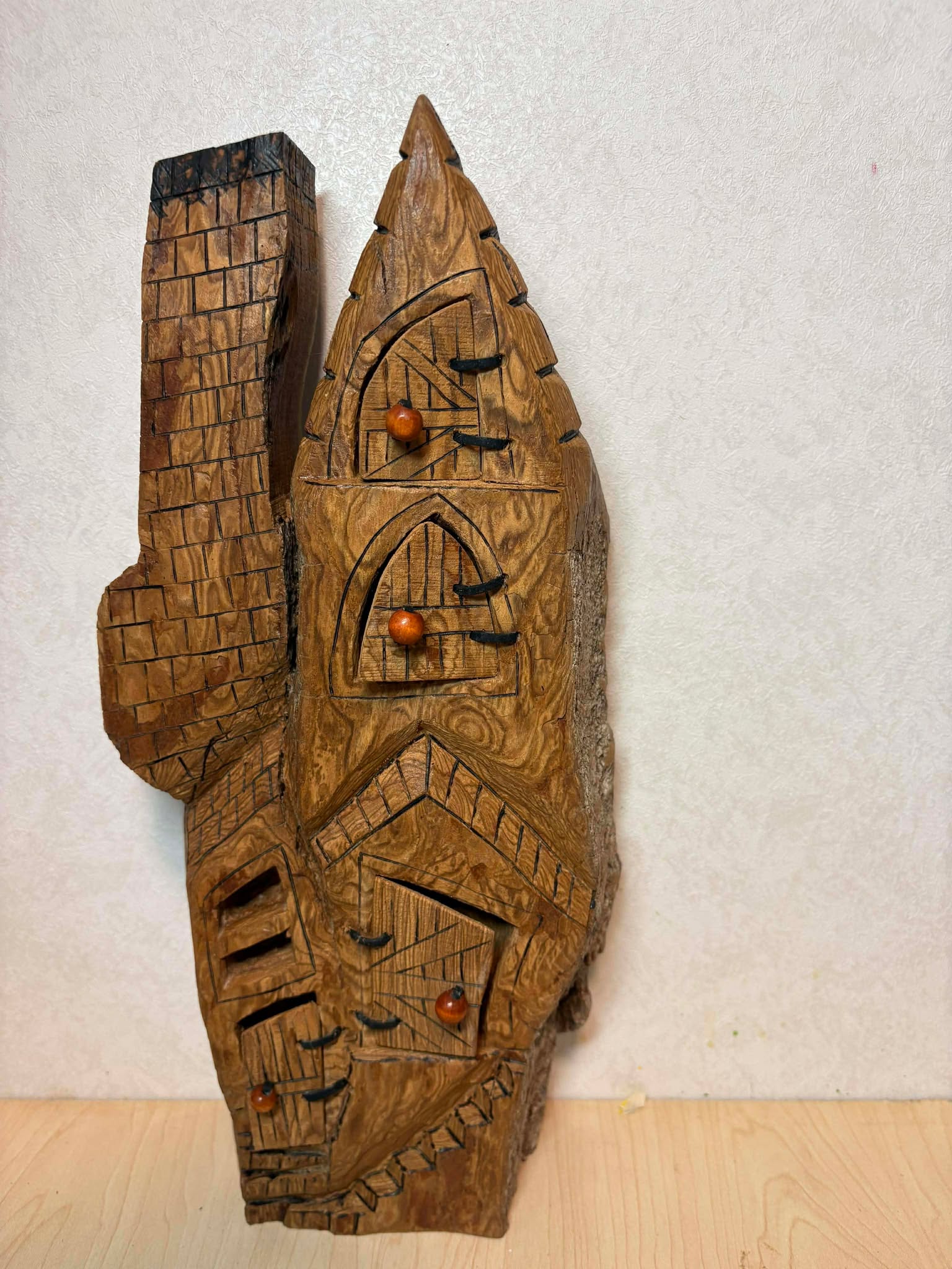 whimsical house wooden carvings