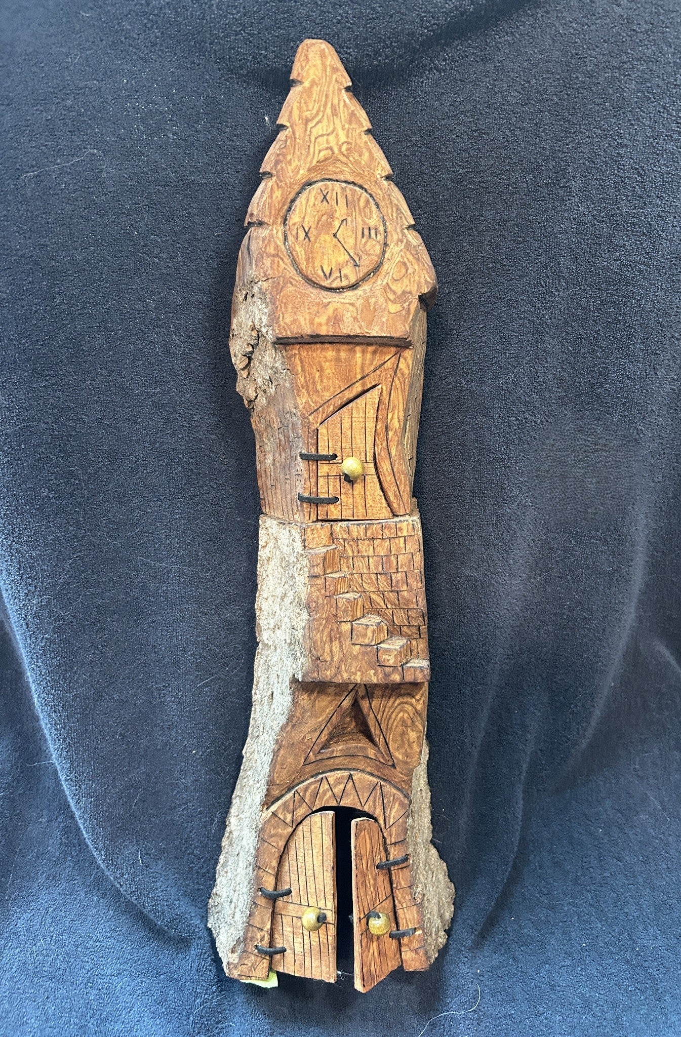 Whimsical House with Carved Clock